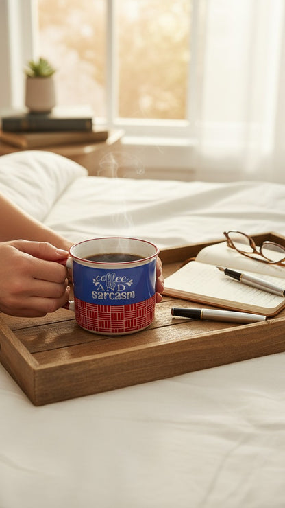 Asoula blue and red ceramic mug with "coffee and sarcasm" text and woven pattern. Ideal for coffee lovers.
