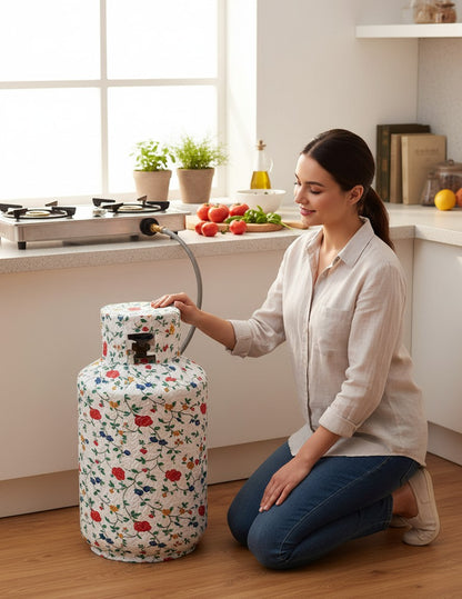 Asoula white gas cylinder cover with a floral pattern of red, blue, and yellow flowers and green vines.