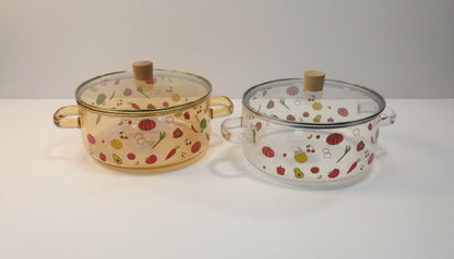 Asoula heat-resistant glass casserole dish with lid, featuring a playful vegetable and fruit pattern. Oven safe.