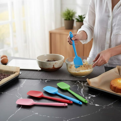 Asoula set of 4 silicone spatulas in pink, red, blue, and green. Ideal for baking, stirring, and scraping.
