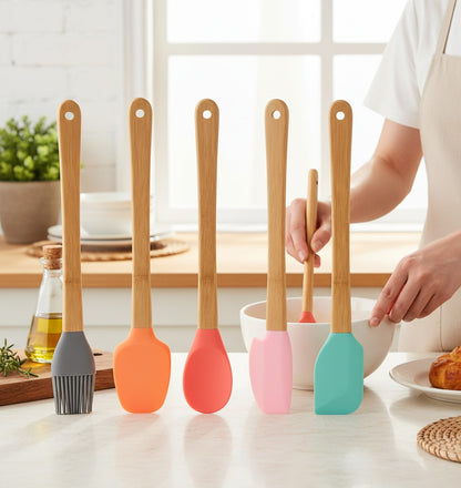 Asoula 6-piece silicone utensil set with wooden handles in assorted colors: grey brush, orange spatula, coral spatula, pink spatula, and teal spatula.