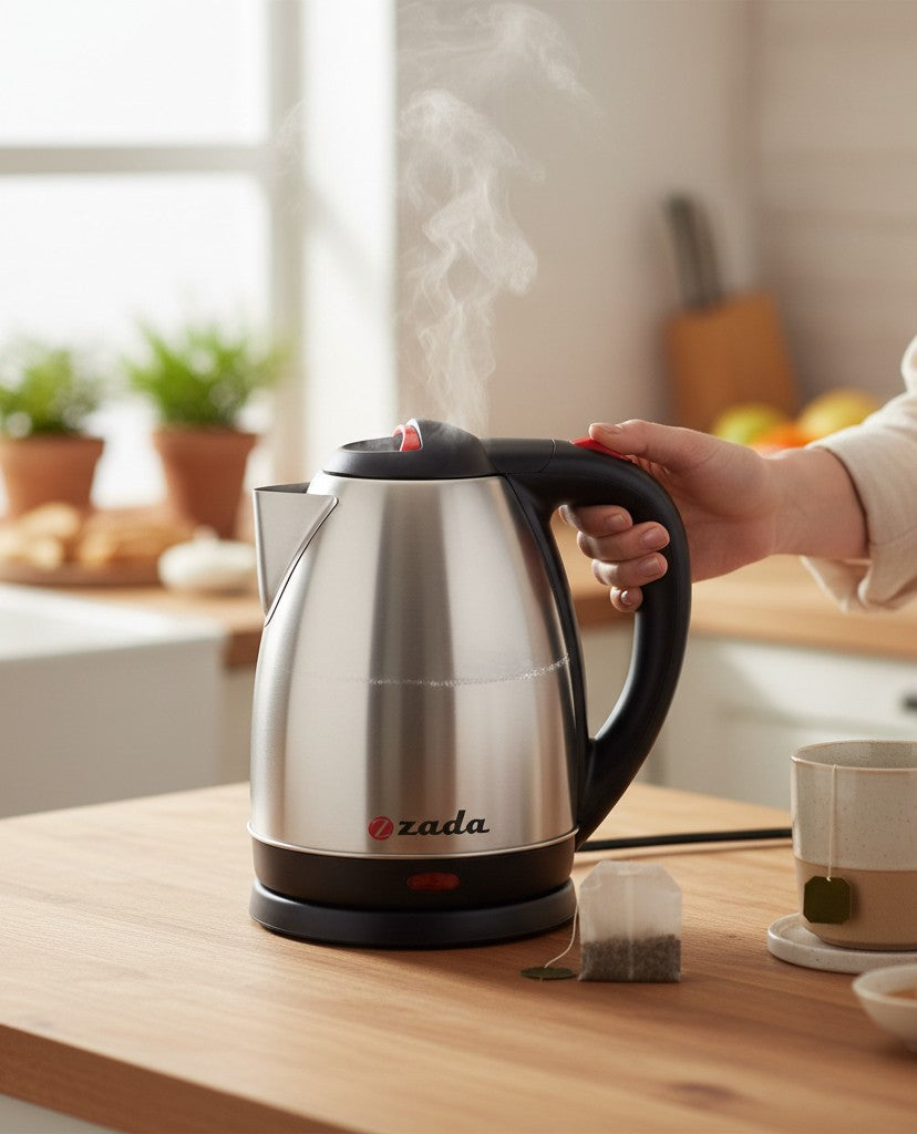 Asoula silver stainless steel electric kettle with black handle and red accents, 1.5L capacity, auto shut-off.