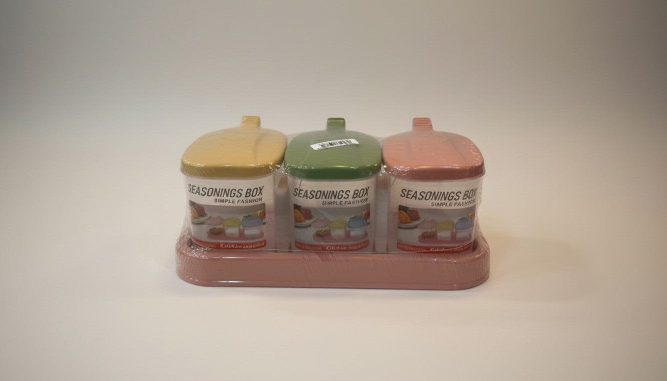 Asoula spice set with three jars in yellow, green, and pink, featuring a tray for kitchen storage.