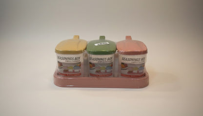 Asoula spice set with three jars in yellow, green, and pink, featuring a tray for kitchen storage.